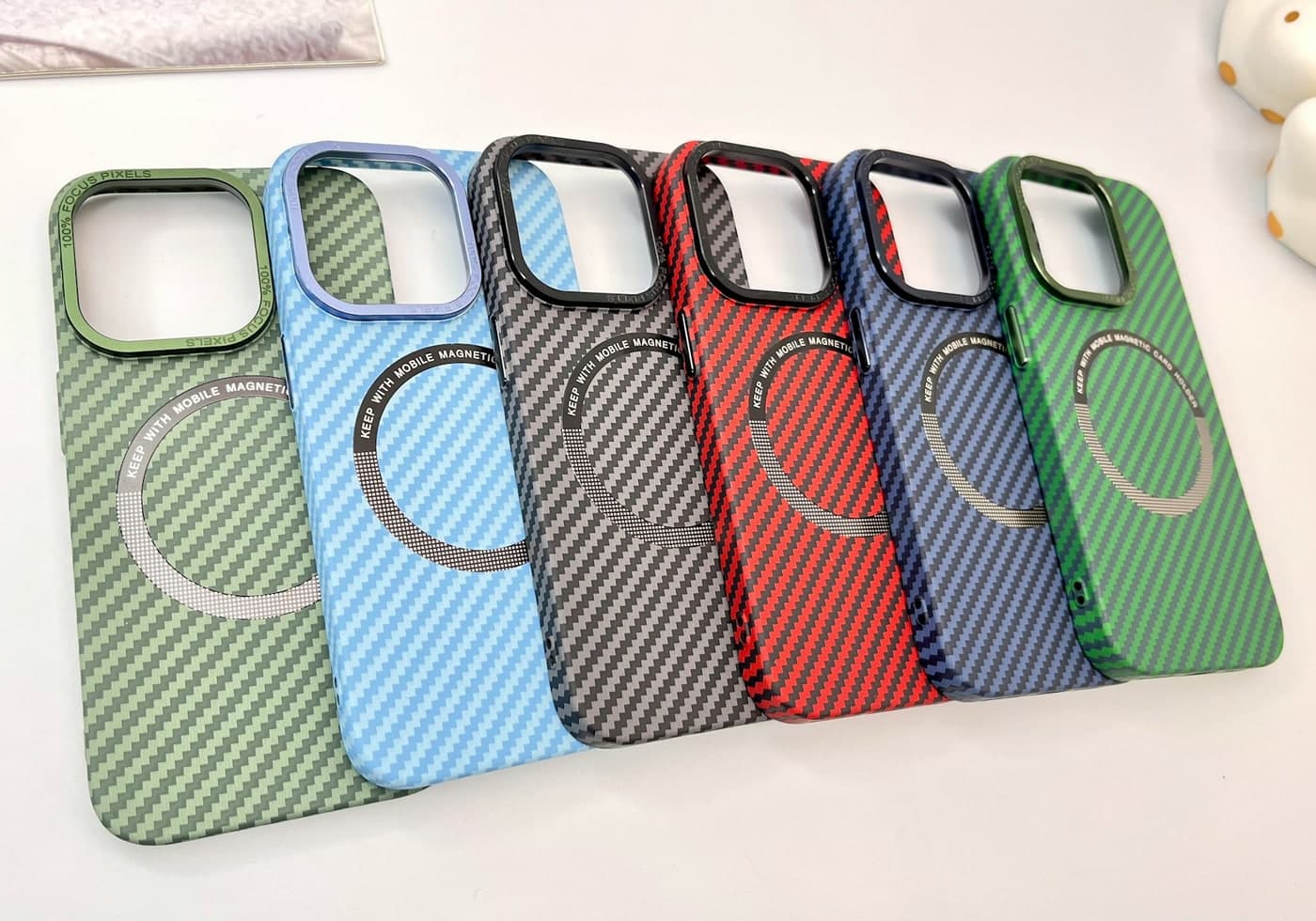 Assorted MagSafe-ready iPhone cases displayed on a white surface